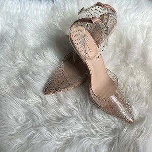 Brand new clear rhinestone studded heel.